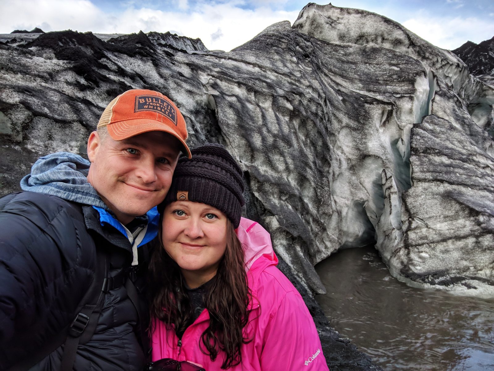Colin and Eliza in front of a glacier in 2018 in Iceland.
